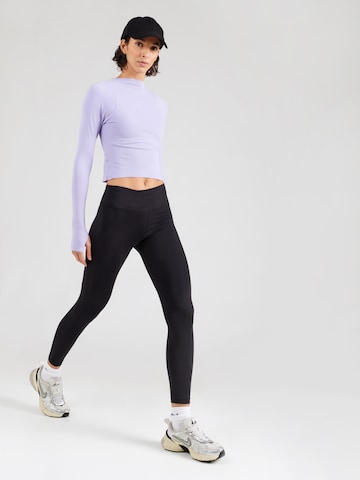 NIKE Skinny Sportbroek in Zwart