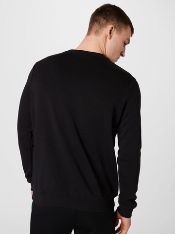 PUMA Sportsweatshirt 'Essentials' in Schwarz