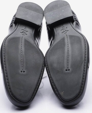 Louis Vuitton Flats & Loafers in 40 in Black