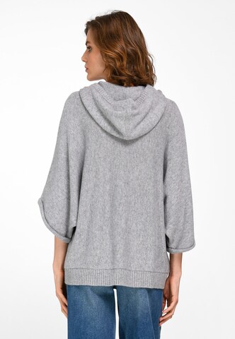 Pull-over include en gris