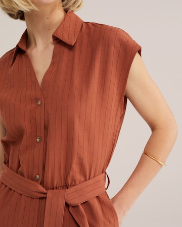 WE Fashion Kombinezon | oranžna barva