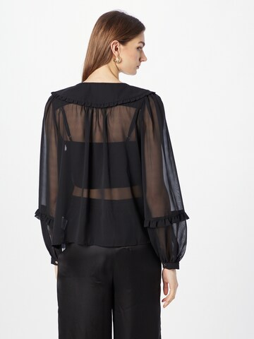 Louche Bluse 'TUPPENCE' in Schwarz