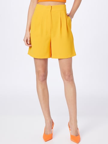 Warehouse Regular Pleat-Front Pants in Orange: front