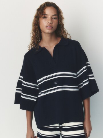 Pull-over self. en bleu : devant
