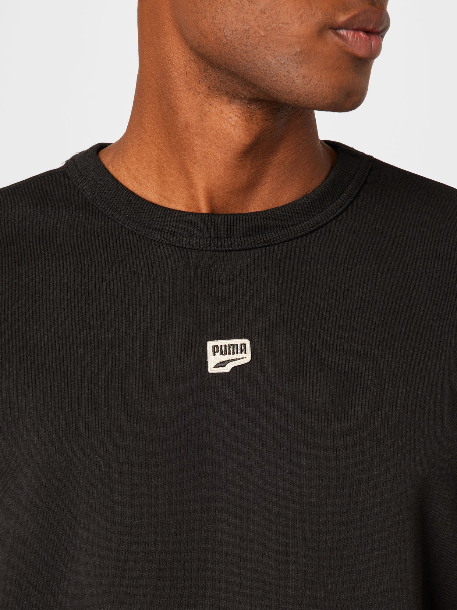 PUMA Sportsweatshirt PUMAx in Schwarz 