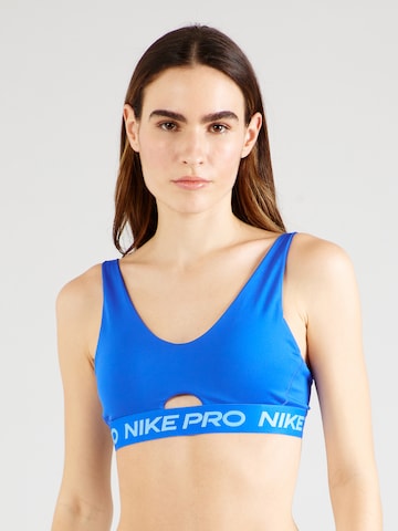 Bustino Reggiseno sportivo 'INDY' di NIKE in blu: frontale