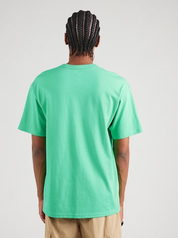 T-Shirt 'PREM ESSNTL' Nike Sportswear en vert