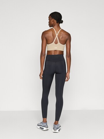 Skinny Pantalon de sport 'Elite' UNDER ARMOUR en noir