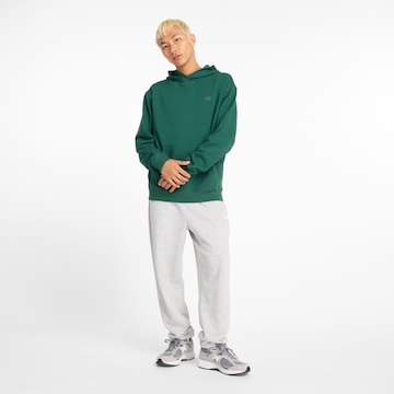 Sweat de sport new balance en vert : devant