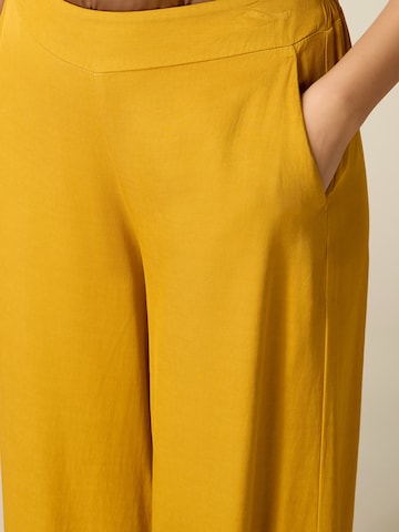 oltre Baggy Trousers in Yellow