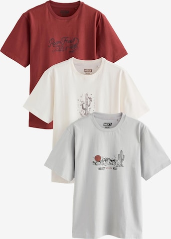 Next T-shirt i grå: framsida