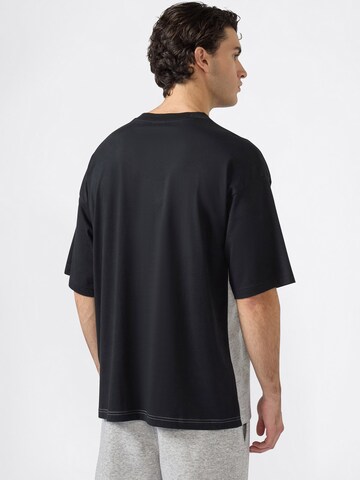 Champion Authentic Athletic Apparel Paita värissä musta