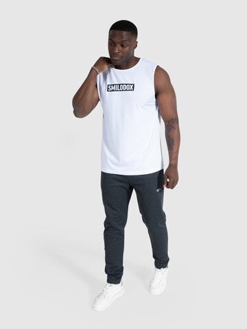 T-Shirt fonctionnel 'Marques' Smilodox en blanc