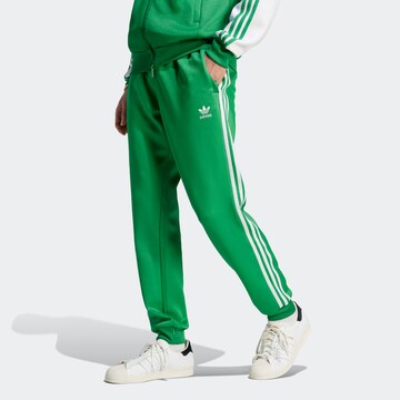 ADIDAS ORIGINALS Tapered Nadrág 'Adicolor Classics+ Sst' - zöld: elől