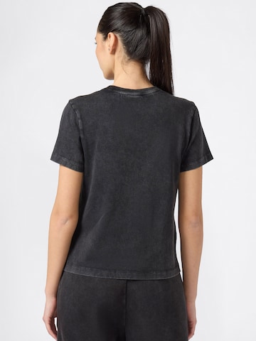 Champion Authentic Athletic Apparel - Camiseta en negro