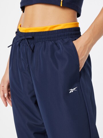 Reebok Tapered Sportbroek in Blauw