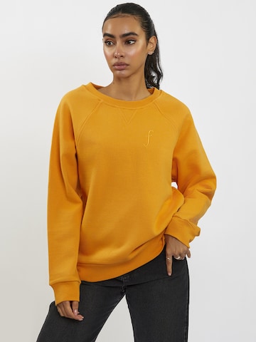 FRESHLIONS Oversized Sweater in Orange: front