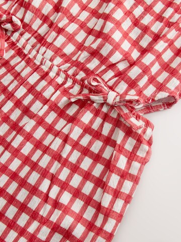 Next Overall värissä punainen