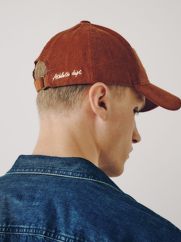 Next Cap in Brown
