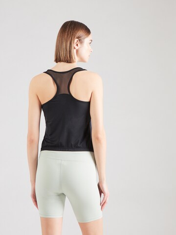 Top sportivo di Champion Authentic Athletic Apparel in nero