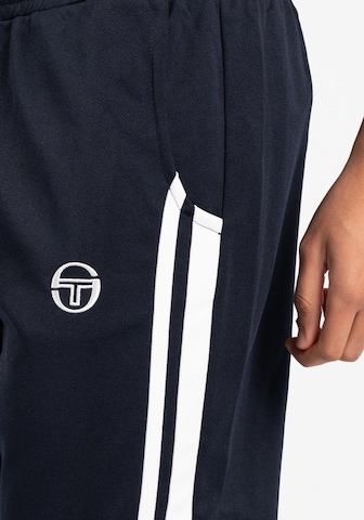 Sergio Tacchini Alt kitsenev Spordipüksid 'NEW DAMARINDO', värv sinine