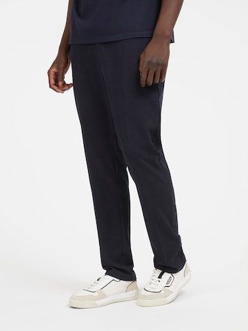 GUESS Slim fit Pants in Blue: front