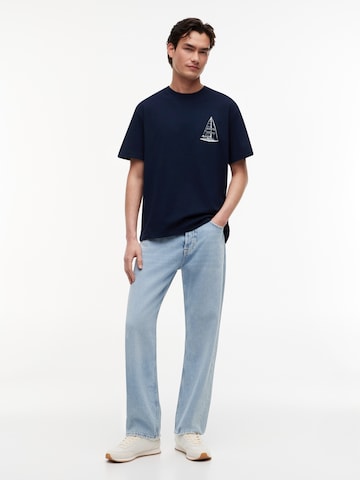 Tommy Jeans T-shirt 'SAILBOAT' i blå