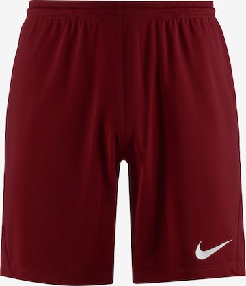 NIKE Workout Pants in Red: front
