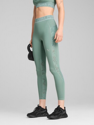 Skinny Pantalon de sport PUMA en vert : devant
