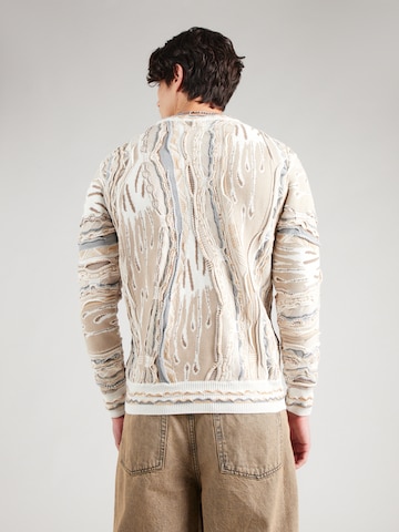 Pull-over Carlo Colucci en beige