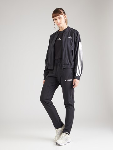 ADIDAS TERREX Slimfit Spodnie outdoor 'Essentials' w kolorze czarny