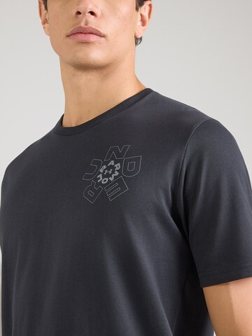 UNDER ARMOUR Λειτουργικό μπλουζάκι 'Radial' σε μαύρο