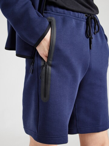 Nike Sportswear - Loosefit Pantalón 'TCH FLC' en azul