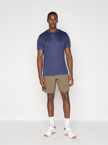 Reebok Funkční tričko 'ID TRAIN' – modrá