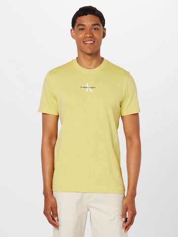 Calvin Klein Jeans Тениска в жълто: отпред