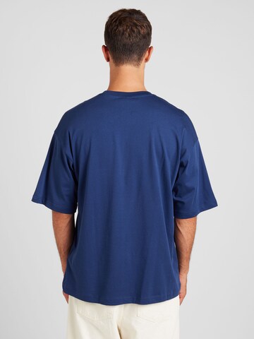 Champion Authentic Athletic Apparel T-shirt i blå