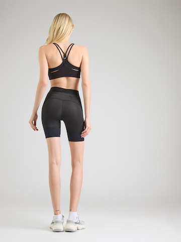 MIZUNO Skinny Športne hlače 'Core Impulse' | črna barva