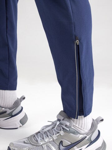 Effilé Pantalon Nike Sportswear en bleu