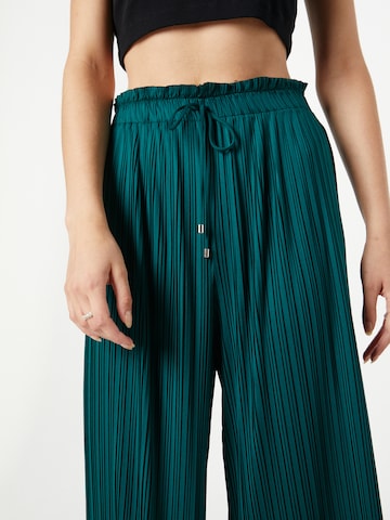 ABOUT YOU Loose fit Pants 'Letizia' in Green