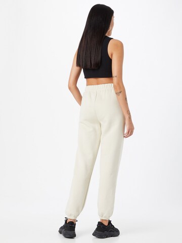 LOCAL HEROES Tapered Trousers in Beige