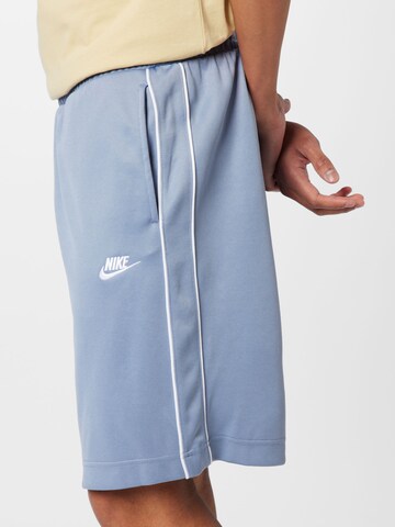 Nike Sportswear - regular Pantalón en azul