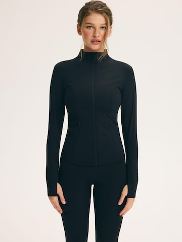 ESOTIQ Sweatshirt 'WARM UP' in Zwart: voorkant