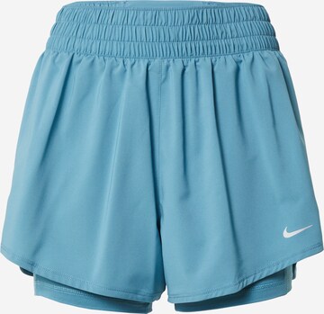 NIKE Sports trousers in Blue: front