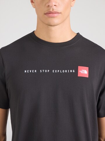 T-Shirt 'NEVER STOP EXPLORING' THE NORTH FACE en noir