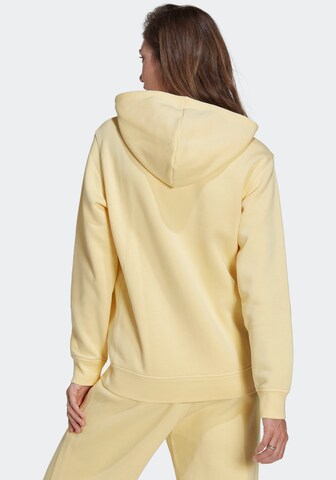 ADIDAS ORIGINALS Dressipluus 'Adicolor Essentials Fleece', värv kollane