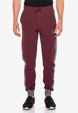 CIPO & BAXX Tapered Pants in Red: front