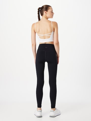 UNDER ARMOUR Skinny Sportovní kalhoty 'Meridian' – černá
