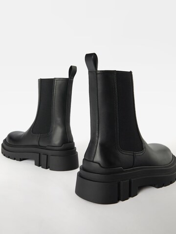 Bershka Chelsea boots in Black