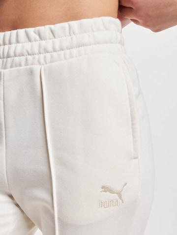 PUMA Rozkloszowany krój Spodnie 'Classics' w kolorze biały