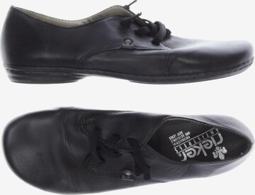 Rieker Flats & Loafers in 41 in Black: front